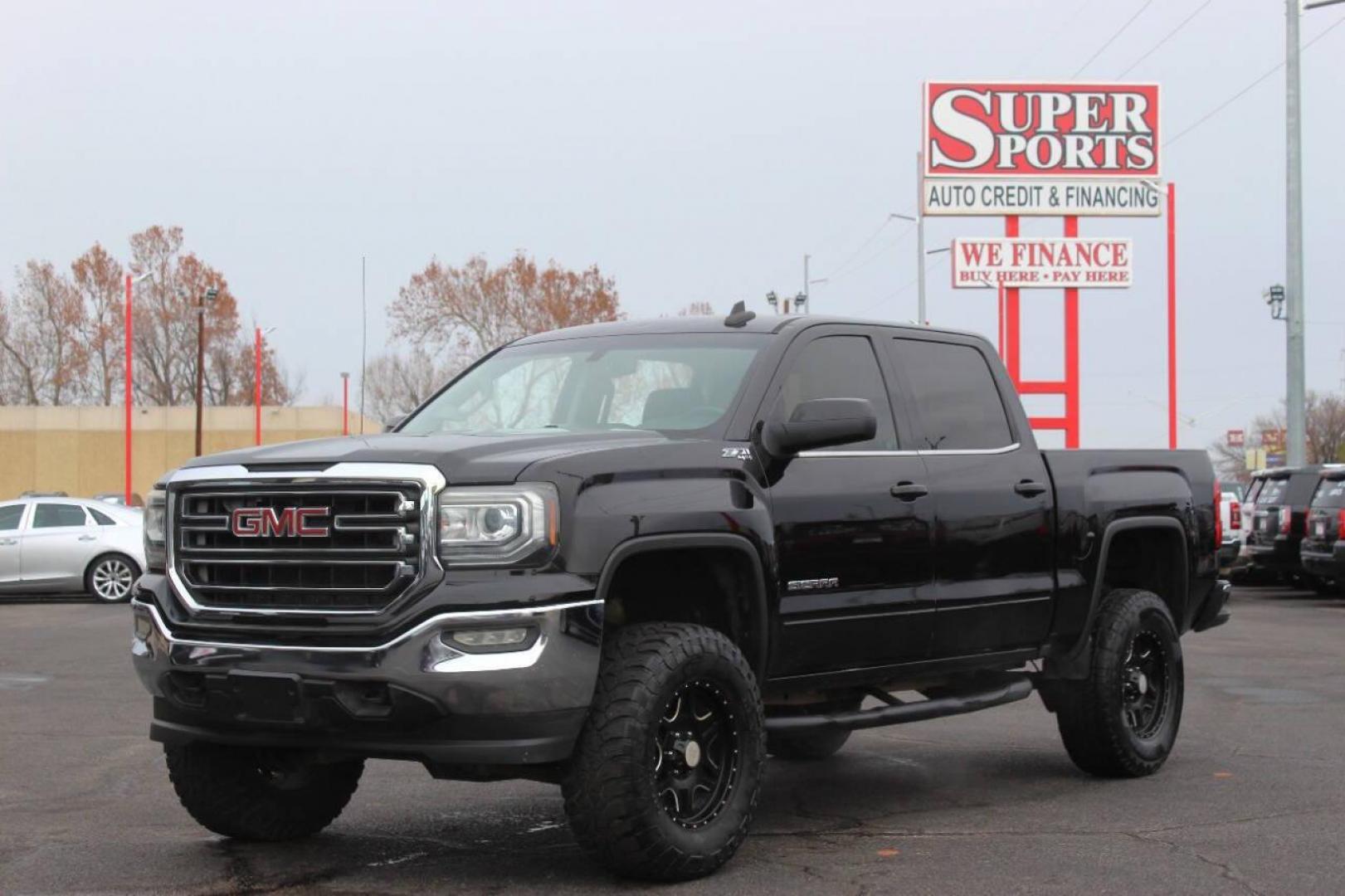 2016 Black GMC Sierra 1500 SLE Crew Cab Long Box 4WD (3GTU2MEC1GG) with an 5.3L V8 OHV 16V engine, 6A transmission, located at 4301 NW 39th , Oklahoma City, OK, 73112, (405) 949-5600, 35.512135, -97.598671 - NO DRIVERS LICENCE NO-FULL COVERAGE INSURANCE-NO CREDIT CHECK. COME ON OVER TO SUPERSPORTS AND TAKE A LOOK AND TEST DRIVE. PLEASE GIVE US A CALL AT (405) 949-5600. NO LICENSIA DE MANEJAR- NO SEGURO DE COBERTURA TOTAL- NO VERIFICACCION DE CREDITO. POR FAVOR VENGAN A SUPERSPORTS, ECHE U - Photo#6