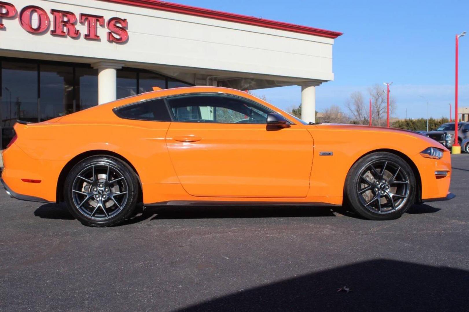 2020 Orange Ford Mustang EcoBoost Coupe (1FA6P8TD6L5) with an 2.3L L4 DOHC 16V engine, Automatic 10-Speed transmission, located at 4301 NW 39th , Oklahoma City, OK, 73112, (405) 949-5600, 35.512135, -97.598671 - NO DRIVERS LICENCE NO-FULL COVERAGE INSURANCE-NO CREDIT CHECK. COME ON OVER TO SUPERSPORTS AND TAKE A LOOK AND TEST DRIVE. PLEASE GIVE US A CALL AT (405) 949-5600. NO LICENSIA DE MANEJAR- NO SEGURO DE COBERTURA TOTAL- NO VERIFICACCION DE CREDITO. POR FAVOR VENGAN A SUPERSPORTS, ECHE UN - Photo#2