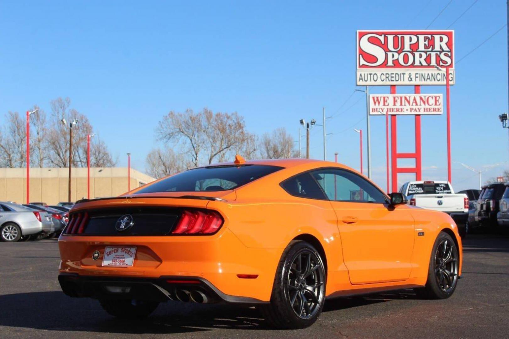 2020 Orange Ford Mustang EcoBoost Coupe (1FA6P8TD6L5) with an 2.3L L4 DOHC 16V engine, Automatic 10-Speed transmission, located at 4301 NW 39th , Oklahoma City, OK, 73112, (405) 949-5600, 35.512135, -97.598671 - NO DRIVERS LICENCE NO-FULL COVERAGE INSURANCE-NO CREDIT CHECK. COME ON OVER TO SUPERSPORTS AND TAKE A LOOK AND TEST DRIVE. PLEASE GIVE US A CALL AT (405) 949-5600. NO LICENSIA DE MANEJAR- NO SEGURO DE COBERTURA TOTAL- NO VERIFICACCION DE CREDITO. POR FAVOR VENGAN A SUPERSPORTS, ECHE UN - Photo#3