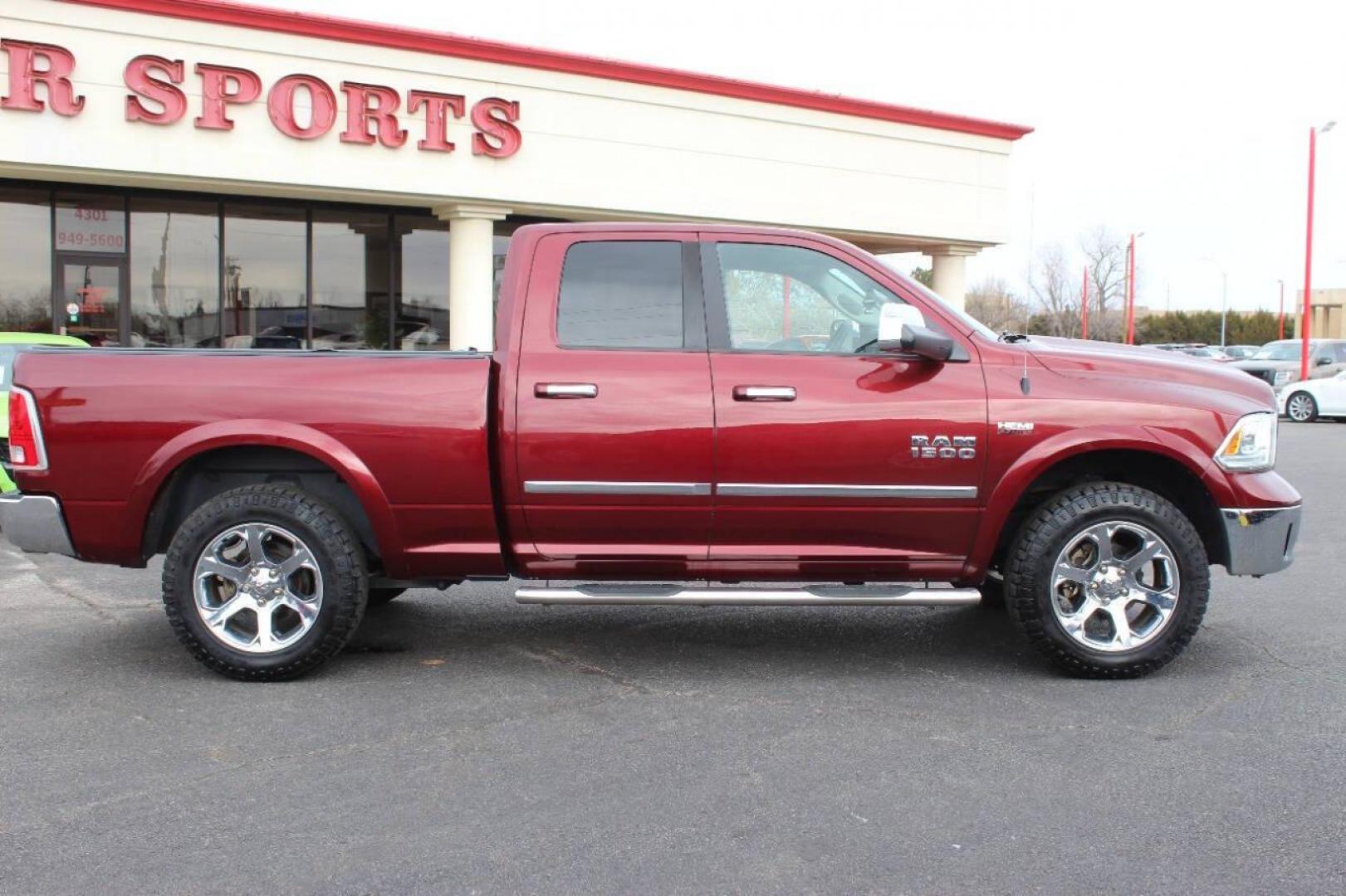 2016 Burgundy RAM 1500 Laramie Quad Cab 4WD (1C6RR7JT8GS) with an 5.7L V8 OHV 16V engine, 6A transmission, located at 4301 NW 39th , Oklahoma City, OK, 73112, (405) 949-5600, 35.512135, -97.598671 - NO DRIVERS LICENCE NO-FULL COVERAGE INSURANCE-NO CREDIT CHECK. COME ON OVER TO SUPERSPORTS AND TAKE A LOOK AND TEST DRIVE. PLEASE GIVE US A CALL AT (405) 949-5600. NO LICENSIA DE MANEJAR- NO SEGURO DE COBERTURA TOTAL- NO VERIFICACCION DE CREDITO. POR FAVOR VENGAN A SUPERSPORTS, ECHE UN - Photo#2