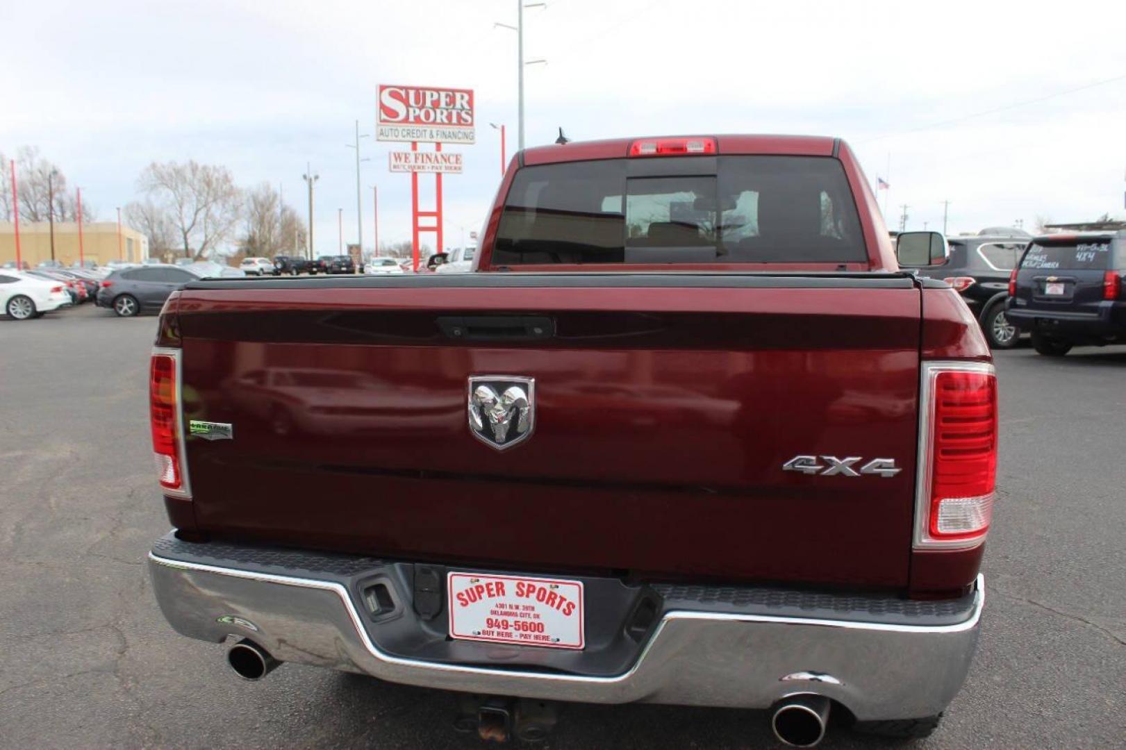 2016 Burgundy RAM 1500 Laramie Quad Cab 4WD (1C6RR7JT8GS) with an 5.7L V8 OHV 16V engine, 6A transmission, located at 4301 NW 39th , Oklahoma City, OK, 73112, (405) 949-5600, 35.512135, -97.598671 - NO DRIVERS LICENCE NO-FULL COVERAGE INSURANCE-NO CREDIT CHECK. COME ON OVER TO SUPERSPORTS AND TAKE A LOOK AND TEST DRIVE. PLEASE GIVE US A CALL AT (405) 949-5600. NO LICENSIA DE MANEJAR- NO SEGURO DE COBERTURA TOTAL- NO VERIFICACCION DE CREDITO. POR FAVOR VENGAN A SUPERSPORTS, ECHE UN - Photo#4