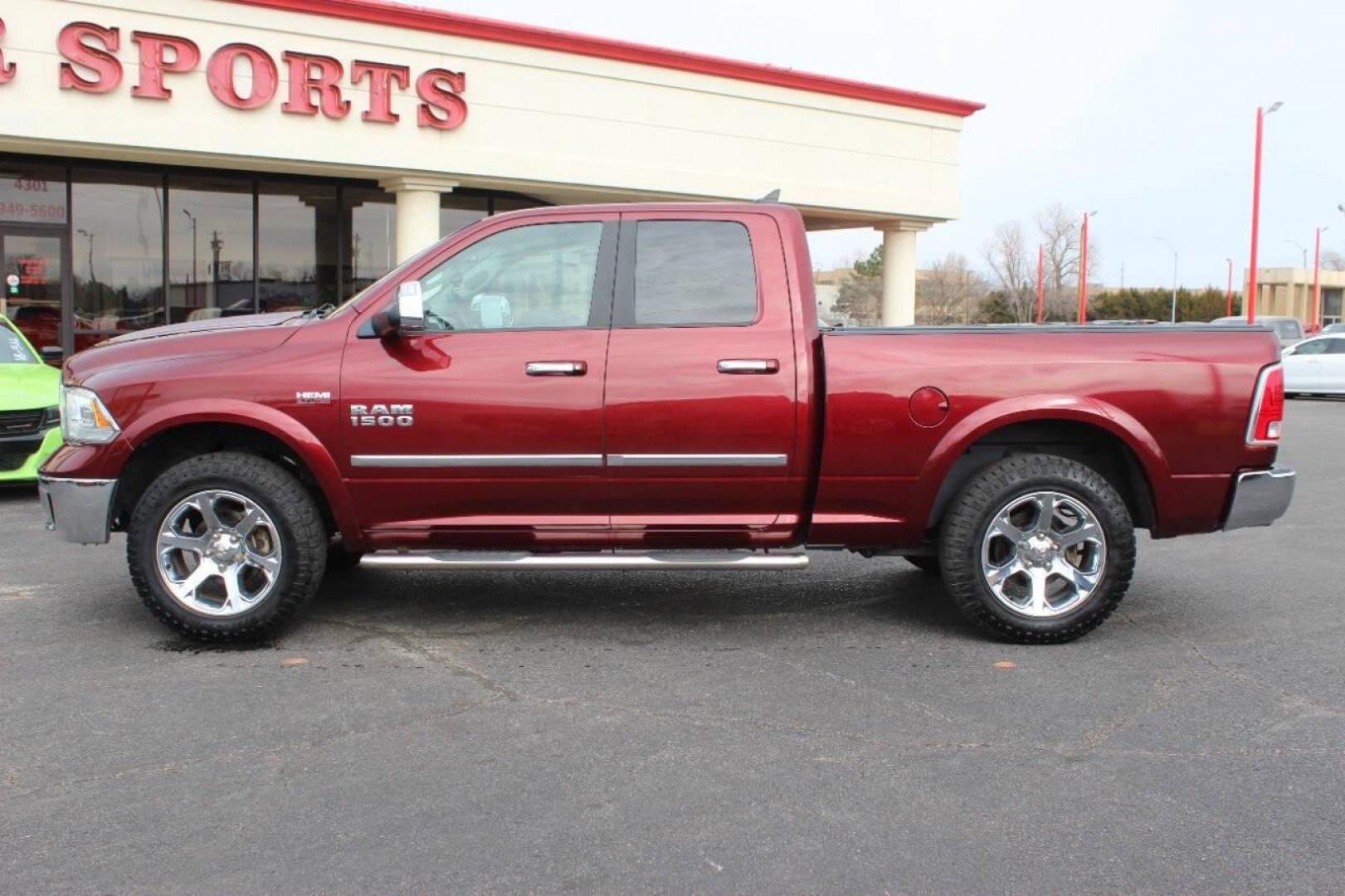 2016 Burgundy RAM 1500 Laramie Quad Cab 4WD (1C6RR7JT8GS) with an 5.7L V8 OHV 16V engine, 6A transmission, located at 4301 NW 39th , Oklahoma City, OK, 73112, (405) 949-5600, 35.512135, -97.598671 - NO DRIVERS LICENCE NO-FULL COVERAGE INSURANCE-NO CREDIT CHECK. COME ON OVER TO SUPERSPORTS AND TAKE A LOOK AND TEST DRIVE. PLEASE GIVE US A CALL AT (405) 949-5600. NO LICENSIA DE MANEJAR- NO SEGURO DE COBERTURA TOTAL- NO VERIFICACCION DE CREDITO. POR FAVOR VENGAN A SUPERSPORTS, ECHE UN - Photo#7