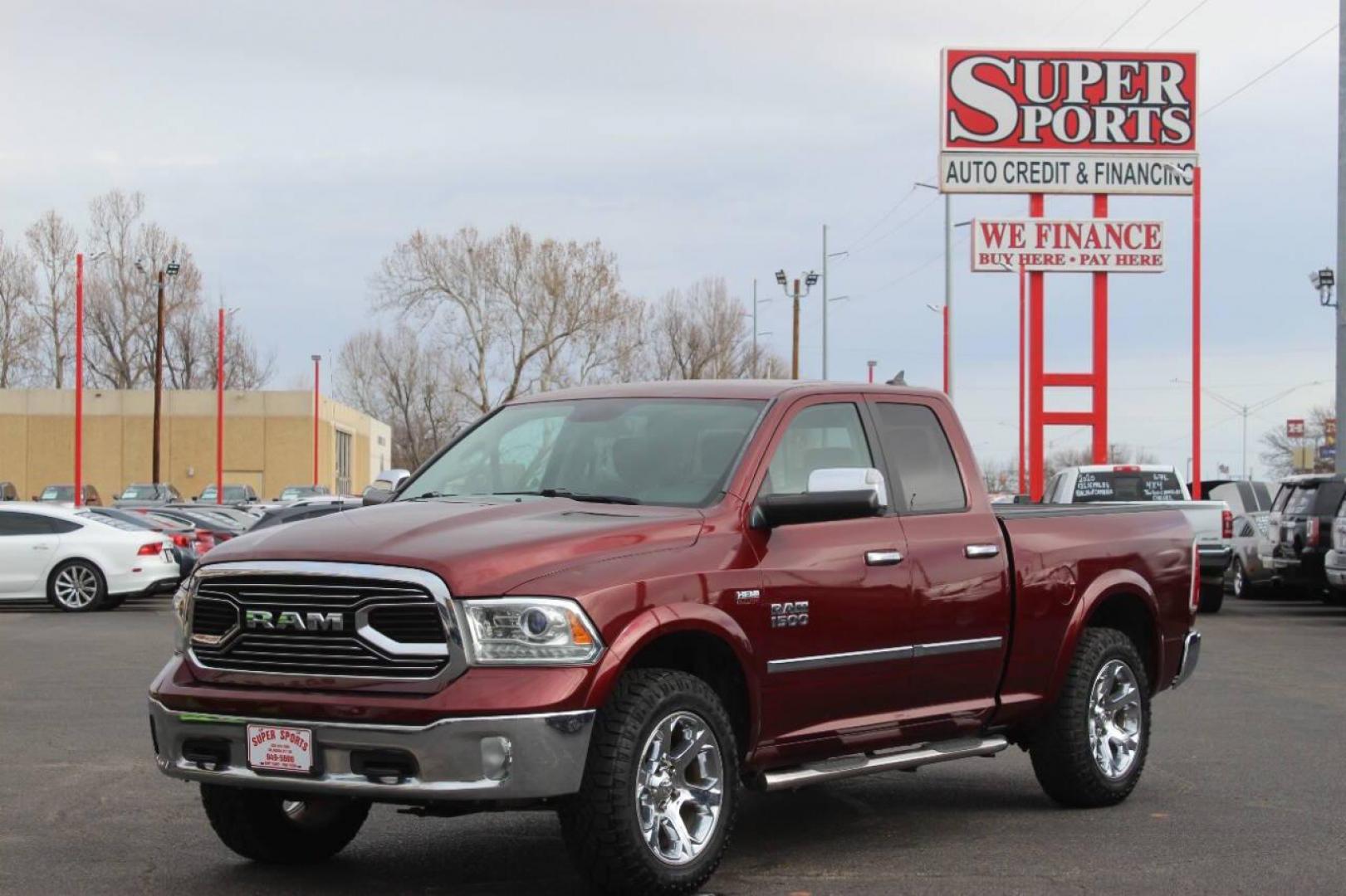 2016 Burgundy RAM 1500 Laramie Quad Cab 4WD (1C6RR7JT8GS) with an 5.7L V8 OHV 16V engine, 6A transmission, located at 4301 NW 39th , Oklahoma City, OK, 73112, (405) 949-5600, 35.512135, -97.598671 - NO DRIVERS LICENCE NO-FULL COVERAGE INSURANCE-NO CREDIT CHECK. COME ON OVER TO SUPERSPORTS AND TAKE A LOOK AND TEST DRIVE. PLEASE GIVE US A CALL AT (405) 949-5600. NO LICENSIA DE MANEJAR- NO SEGURO DE COBERTURA TOTAL- NO VERIFICACCION DE CREDITO. POR FAVOR VENGAN A SUPERSPORTS, ECHE UN - Photo#8