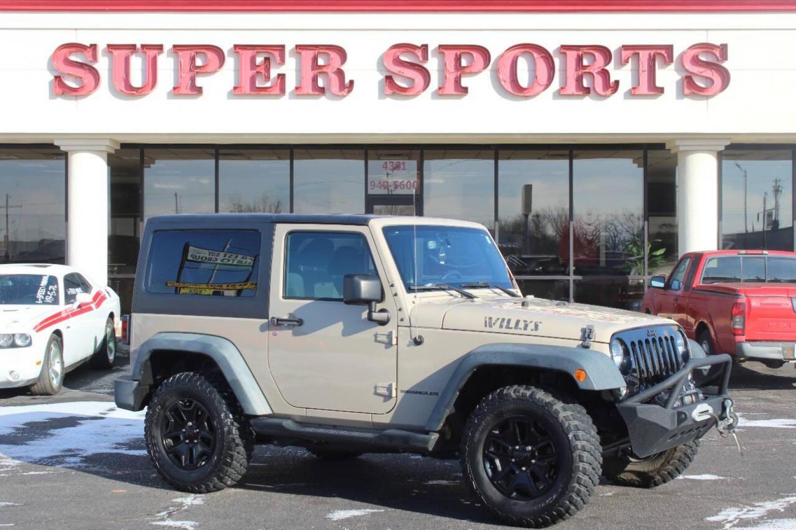 2016 Tan Jeep Wrangler Sport 4WD (1C4AJWAG7GL) with an 3.6L V6 DOHC 24V FFV engine, Automatic 5-Speed transmission, located at 4301 NW 39th , Oklahoma City, OK, 73112, (405) 949-5600, 35.512135, -97.598671 - NO DRIVERS LICENCE NO-FULL COVERAGE INSURANCE-NO CREDIT CHECK. COME ON OVER TO SUPERSPORTS AND TAKE A LOOK AND TEST DRIVE. PLEASE GIVE US A CALL AT (405) 949-5600. NO LICENSIA DE MANEJAR- NO SEGURO DE COBERTURA TOTAL- NO VERIFICACCION DE CREDITO. POR FAVOR VENGAN A SUPERSPORTS, ECHE U - Photo#0