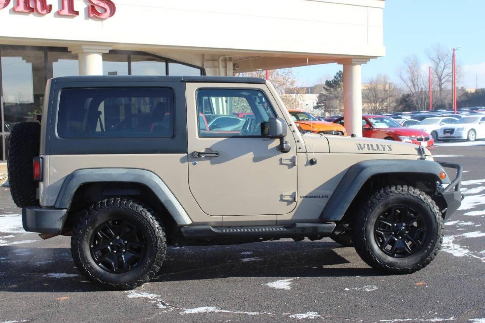 2016 Tan Jeep Wrangler Sport 4WD (1C4AJWAG7GL) with an 3.6L V6 DOHC 24V FFV engine, Automatic 5-Speed transmission, located at 4301 NW 39th , Oklahoma City, OK, 73112, (405) 949-5600, 35.512135, -97.598671 - NO DRIVERS LICENCE NO-FULL COVERAGE INSURANCE-NO CREDIT CHECK. COME ON OVER TO SUPERSPORTS AND TAKE A LOOK AND TEST DRIVE. PLEASE GIVE US A CALL AT (405) 949-5600. NO LICENSIA DE MANEJAR- NO SEGURO DE COBERTURA TOTAL- NO VERIFICACCION DE CREDITO. POR FAVOR VENGAN A SUPERSPORTS, ECHE U - Photo#2