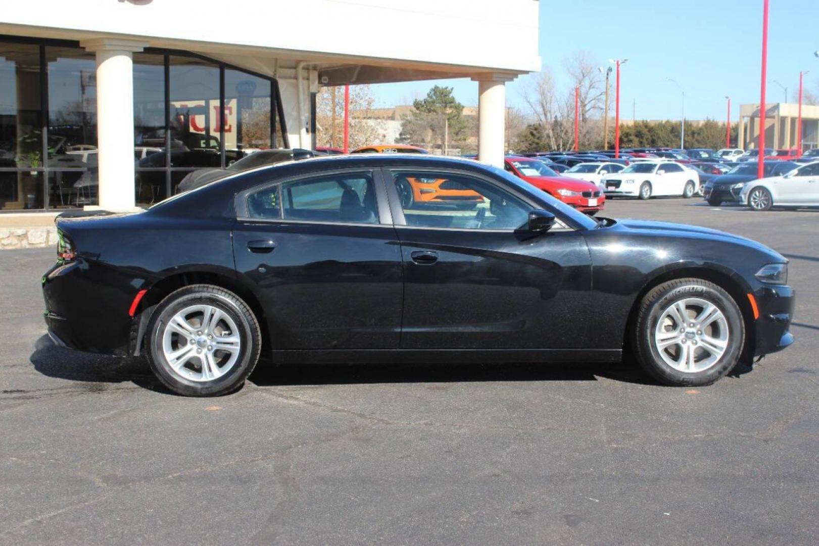 2023 Black Dodge Charger SXT (2C3CDXBG5PH) with an 3.6L V6 DOHC 24V engine, 8A transmission, located at 4301 NW 39th , Oklahoma City, OK, 73112, (405) 949-5600, 35.512135, -97.598671 - NO DRIVERS LICENCE NO-FULL COVERAGE INSURANCE-NO CREDIT CHECK. COME ON OVER TO SUPERSPORTS AND TAKE A LOOK AND TEST DRIVE. PLEASE GIVE US A CALL AT (405) 949-5600. NO LICENSIA DE MANEJAR- NO SEGURO DE COBERTURA TOTAL- NO VERIFICACCION DE CREDITO. POR FAVOR VENGAN A SUPERSPORTS, ECHE UN - Photo#2