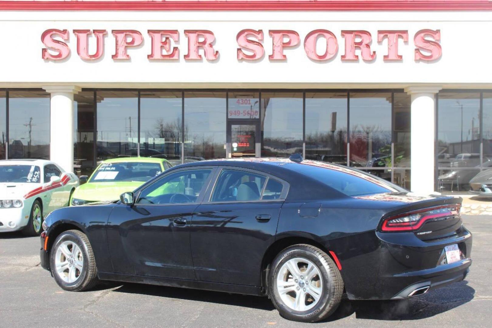 2023 Black Dodge Charger SXT (2C3CDXBG5PH) with an 3.6L V6 DOHC 24V engine, 8A transmission, located at 4301 NW 39th , Oklahoma City, OK, 73112, (405) 949-5600, 35.512135, -97.598671 - NO DRIVERS LICENCE NO-FULL COVERAGE INSURANCE-NO CREDIT CHECK. COME ON OVER TO SUPERSPORTS AND TAKE A LOOK AND TEST DRIVE. PLEASE GIVE US A CALL AT (405) 949-5600. NO LICENSIA DE MANEJAR- NO SEGURO DE COBERTURA TOTAL- NO VERIFICACCION DE CREDITO. POR FAVOR VENGAN A SUPERSPORTS, ECHE UN - Photo#4