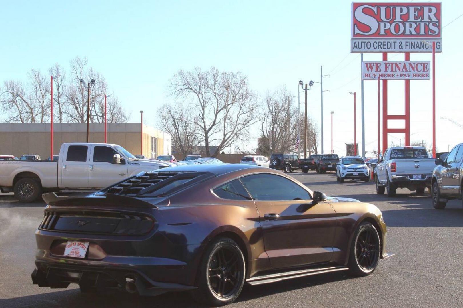 2019 Purple Ford Mustang EcoBoost Coupe (1FA6P8TH5K5) with an 2.3L L4 DOHC 16V engine, Automatic 10-Speed transmission, located at 4301 NW 39th , Oklahoma City, OK, 73112, (405) 949-5600, 35.512135, -97.598671 - NO DRIVERS LICENCE NO-FULL COVERAGE INSURANCE-NO CREDIT CHECK. COME ON OVER TO SUPERSPORTS AND TAKE A LOOK AND TEST DRIVE. PLEASE GIVE US A CALL AT (405) 949-5600. NO LICENSIA DE MANEJAR- NO SEGURO DE COBERTURA TOTAL- NO VERIFICACCION DE CREDITO. POR FAVOR VENGAN A SUPERSPORTS, ECHE UN - Photo#3