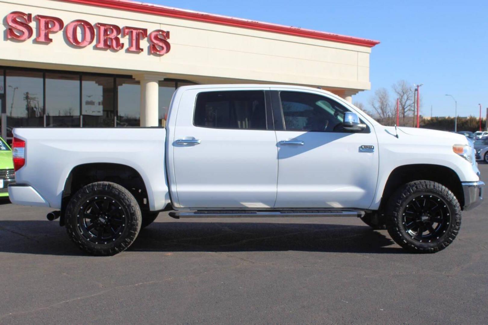 2015 White Toyota Tundra Platinum CrewMax 5.7L FFV 4WD (5TFAW5F18FX) with an 5.7L V8 DOHC 32V engine, 6-Speed Automatic transmission, located at 4301 NW 39th , Oklahoma City, OK, 73112, (405) 949-5600, 35.512135, -97.598671 - NO DRIVERS LICENCE NO-FULL COVERAGE INSURANCE-NO CREDIT CHECK. COME ON OVER TO SUPERSPORTS AND TAKE A LOOK AND TEST DRIVE. PLEASE GIVE US A CALL AT (405) 949-5600. NO LICENSIA DE MANEJAR- NO SEGURO DE COBERTURA TOTAL- NO VERIFICACCION DE CREDITO. POR FAVOR VENGAN A SUPERSPORTS, ECHE UN - Photo#2