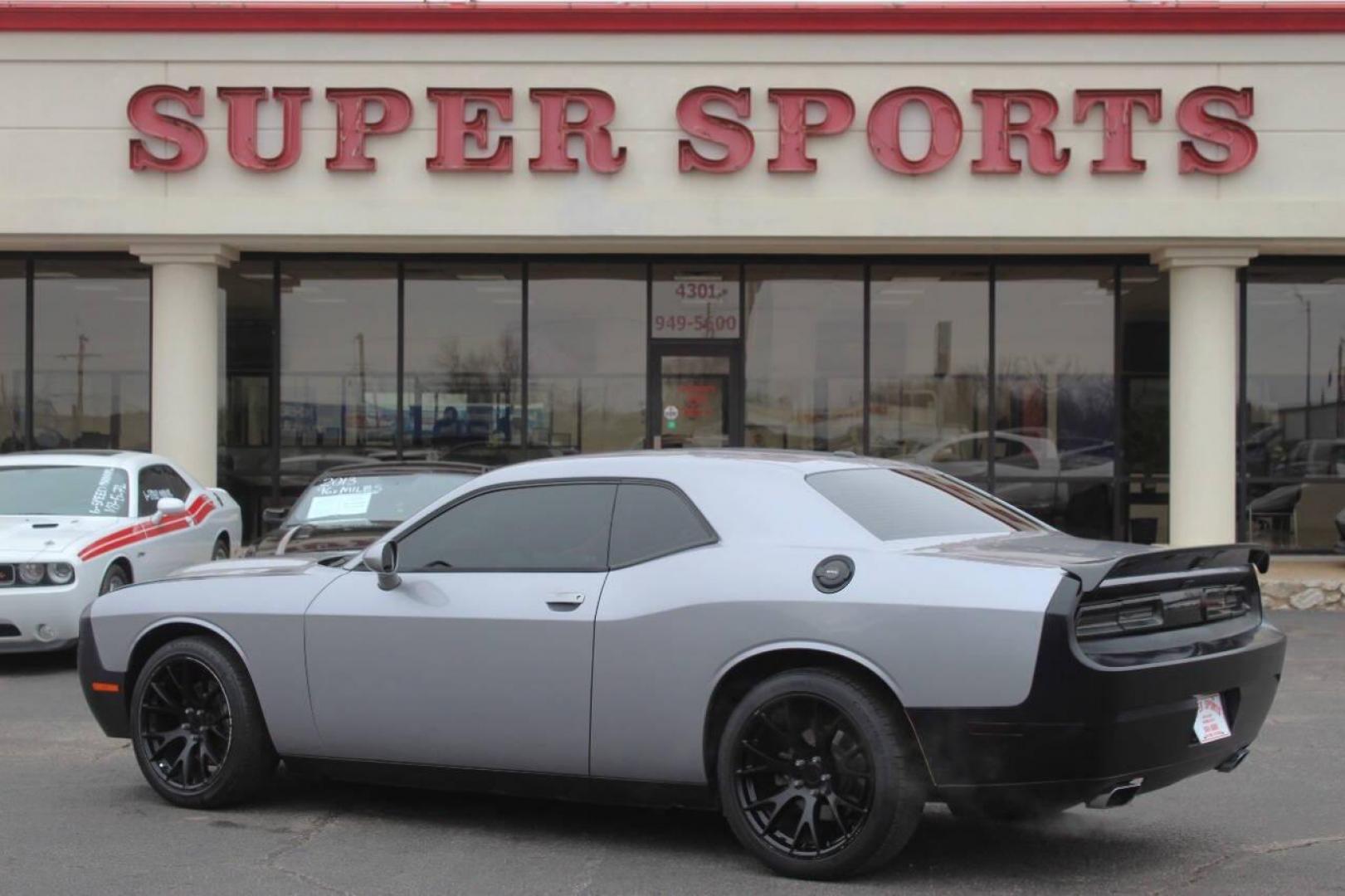 2014 Gray Dodge Challenger SXT (2C3CDYAG0EH) with an 3.6L V6 DOHC 24V engine, 5-Speed Automatic transmission, located at 4301 NW 39th , Oklahoma City, OK, 73112, (405) 949-5600, 35.512135, -97.598671 - NO DRIVERS LICENCE NO-FULL COVERAGE INSURANCE-NO CREDIT CHECK. COME ON OVER TO SUPERSPORTS AND TAKE A LOOK AND TEST DRIVE. PLEASE GIVE US A CALL AT (405) 949-5600. NO LICENSIA DE MANEJAR- NO SEGURO DE COBERTURA TOTAL- NO VERIFICACCION DE CREDITO. POR FAVOR VENGAN A SUPERSPORTS, ECHE UN - Photo#4